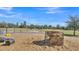 Open pasture with hay bale and farm animals at 2455 Gerber Dairy Rd, Winter Haven, FL 33880