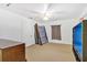 Bedroom with carpeted floor, large closet, and window at 2522 Burns St, Lakeland, FL 33801