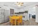 Eat-in kitchen with stainless steel appliances and wood table at 2522 Burns St, Lakeland, FL 33801