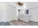 Laundry room with washer, dryer, and built-in shelving at 2522 Burns St, Lakeland, FL 33801