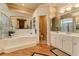 Elegant bathroom with a soaking tub and double vanity at 3116 Hawks Ridge Dr, Lakeland, FL 33810