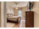 Bright bedroom with a double bed and wooden dresser at 3116 Hawks Ridge Dr, Lakeland, FL 33810