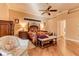 Main bedroom with a king-size bed and wood flooring at 3116 Hawks Ridge Dr, Lakeland, FL 33810