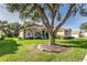 Exterior view of a house nestled amongst mature trees at 3116 Hawks Ridge Dr, Lakeland, FL 33810