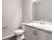 Small bathroom with single vanity and toilet at 3142 Laurel Oak Ln, Winter Haven, FL 33884