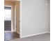 Simple bedroom with gray walls and gray carpeting at 3142 Laurel Oak Ln, Winter Haven, FL 33884