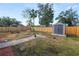 Large backyard with shed, firepit and fence at 345 Piedmont Ct, Bartow, FL 33830