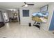 Living room with sectional sofa, dining area, and tile flooring at 345 Piedmont Ct, Bartow, FL 33830