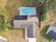 Overhead view of house, pool, and solar panels at 3457 Christina Groves Ln, Lakeland, FL 33813