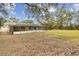 Home with screened in pool and large backyard at 3457 Christina Groves Ln, Lakeland, FL 33813