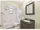 Clean bathroom with a vanity, toilet, and shower/tub combo at 3457 Christina Groves Ln, Lakeland, FL 33813