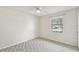 Well-lit bedroom with window and carpet flooring at 3457 Christina Groves Ln, Lakeland, FL 33813