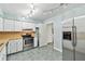 Modern kitchen with stainless steel appliances and light blue walls at 3457 Christina Groves Ln, Lakeland, FL 33813