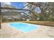 Inviting screened pool with spacious backyard at 3457 Christina Groves Ln, Lakeland, FL 33813