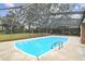 Relaxing pool area with screened enclosure at 3457 Christina Groves Ln, Lakeland, FL 33813