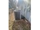 View of the house's AC unit in the backyard at 3638 W Wheeler Rd, Lakeland, FL 33810