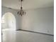 Dining room with tile floor and arched doorway at 3638 W Wheeler Rd, Lakeland, FL 33810