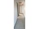 Clean hallway with tile flooring at 3638 W Wheeler Rd, Lakeland, FL 33810