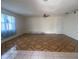 Spacious living room with tile flooring and ceiling fan at 3638 W Wheeler Rd, Lakeland, FL 33810