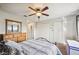 Bright bedroom with ceiling fan and a mirrored dresser at 4235 Winding Vine Dr # 148, Lakeland, FL 33812