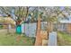 View of backyard with shed and old materials at 470 Lucille St, Bartow, FL 33830