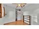 Bedroom with wood-look flooring and built-in shelving at 470 Lucille St, Bartow, FL 33830