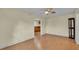 Bright living room with hardwood floors and kitchen access at 470 Lucille St, Bartow, FL 33830