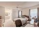 Spacious bedroom with a queen-size bed, built-in closet and workspace at 4854 Colonnades Club Blvd, Lakeland, FL 33811