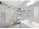 Bathroom with marble shower and vanity at 4938 Deerwood Dr, Lakeland, FL 33810