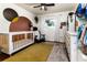 Bright Bedroom with crib, dresser, and playful wall art at 518 Boger N Blvd, Lakeland, FL 33803