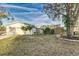 Single-story home with attached garage and mature landscaping at 518 Boger N Blvd, Lakeland, FL 33803