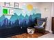 room with mountain mural and rocking chair at 518 Boger N Blvd, Lakeland, FL 33803