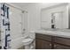 Bathroom with single vanity and shower/tub combo at 6046 Eagle Pointe Dr, Lakeland, FL 33812