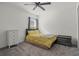 Small bedroom with a single bed and ceiling fan at 6046 Eagle Pointe Dr, Lakeland, FL 33812