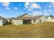 House exterior view, showcasing backyard at 6046 Eagle Pointe Dr, Lakeland, FL 33812