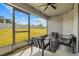 Relaxing screened porch with seating area at 6046 Eagle Pointe Dr, Lakeland, FL 33812