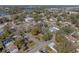 Aerial view showing home's location in a residential neighborhood at 702 Nw 1St Ave, Mulberry, FL 33860