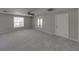 Spacious bedroom with ceiling fan and ample natural light at 702 Nw 1St Ave, Mulberry, FL 33860