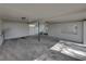 Interior view of the carport, showing concrete floor and lighting at 702 Nw 1St Ave, Mulberry, FL 33860