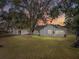 Charming house with a spacious yard, and carport at 702 Nw 1St Ave, Mulberry, FL 33860