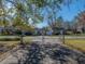 House with driveway and a spacious front yard at 702 Nw 1St Ave, Mulberry, FL 33860