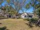 Ranch style house with carport and large yard at 702 Nw 1St Ave, Mulberry, FL 33860