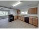 Eat-in kitchen with modern appliances and ample counter space at 702 Nw 1St Ave, Mulberry, FL 33860