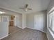 Spacious living room featuring wood-look floors and an open concept at 702 Nw 1St Ave, Mulberry, FL 33860