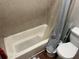 Bathroom with shower/tub combo and toilet at 709 E Lowell St, Lakeland, FL 33805