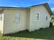 Side view of house showing additional exterior features at 709 E Lowell St, Lakeland, FL 33805