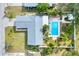 Bird's eye view of a house with a pool and large backyard at 813 Heron Pl, Winter Haven, FL 33884