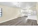 Modern kitchen with white cabinets, quartz countertops, and stainless steel appliances at 813 Heron Pl, Winter Haven, FL 33884