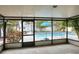 Screened porch overlooking the pool area at 813 Heron Pl, Winter Haven, FL 33884