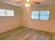 Well-lit bedroom with light flooring and ceiling fan at 8655 Sw 98Th Street Rd # A, Ocala, FL 34481